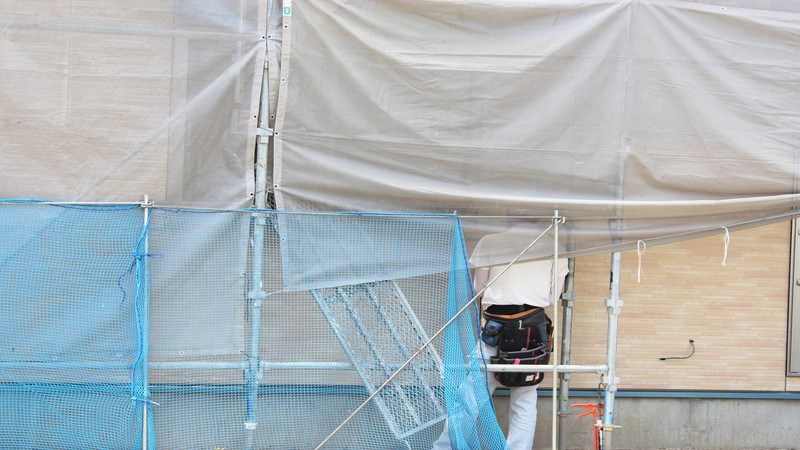 足場、作業員、後ろ姿